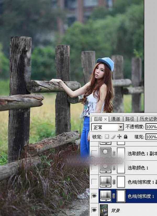 Photoshop为木桩边的美女人物加上高对比蓝黄色效果教程